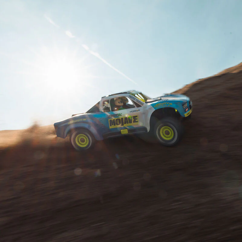 ARRMA MOJAVE GROM MEGA 380 Brushed 4X4 Small Scale Desert Truck RTR with Battery & Charger - Blue/White - Image 12