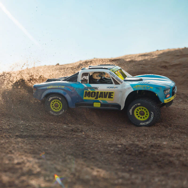 ARRMA MOJAVE GROM MEGA 380 Brushed 4X4 Small Scale Desert Truck RTR with Battery & Charger - Blue/White - Image 17
