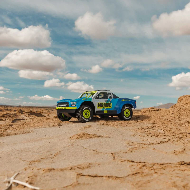 ARRMA MOJAVE GROM MEGA 380 Brushed 4X4 Small Scale Desert Truck RTR with Battery & Charger - Blue/White - Image 7